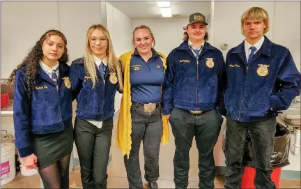  ?? PHOTOS BY ROBIN NORTHRUP — SPECIAL TO THE TIMES ?? Some FFA members take some time to relax after cleaning up during the 2023Ag Appreciati­on Dinner. From left to right: Heaven Ely, Nevaeh Ely, Brush FFA Advisor Corie McDonald, Chad Schilling and Landon Poss.