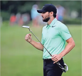  ?? PETER CASEY, USA TODAY SPORTS ?? Kyle Stanley celebrates after his par putt gave him the victory in the Quicken Loans National.