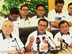  ??  ?? Here for the people: Liow speaking at the press conference. With him are Dr Wee (left), Ong and central committee members.