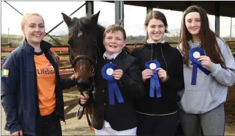  ?? Photo by Michelle Cooper Galvin ?? Roisin Clifford with Winnie and the three winners Caden O’Donoghue, Glenflesk; Eilish Casey, Killarney and Kassie O’Sullivan, Killorglin at the Pony Tales Stables Charity Day in aid of the RNLI on Sunday.
