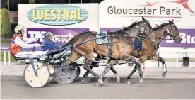  ?? Picture / Jodie Hallows ?? Mark Purdon (blue) drives Smolda to victory in the Interdom Final in Perth in December.