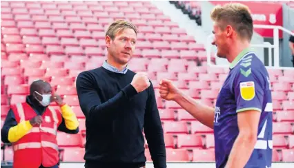  ?? Picture: Rogan Thomson/JMP ?? Dean Holden celebrates Bristol City’s win yesterday with defender Taylor Moore