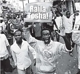  ??  ?? Protestors in the slums of Kenya’s capital city, Nairobi