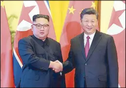  ?? AFP ?? North Korean leader Kim Jong-un poses with Chinese President Xi Jinping at the Great Hall of the People in Beijing on Monday.