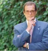  ??  ?? This is a April 22, 1996 file photo of veteran British actor Roger Moore, poses for a portrait, in the Studio City section of Los Angeles.