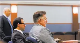  ?? ELIZABETH BRUMLEY/LAS VEGAS REVIEW-JOURNAL ?? Brent Dennis, the Boulder City psychologi­st facing a murder charge in the death of his wife, attorney Susan Winters, listens at his hearing Tuesday at the Regional Justice Center.