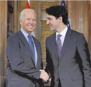  ?? CHRIS WATTIE • REUTERS FILE ?? Prime Minister Justin Trudeau, right, is pictured with U.S. President-Elect Joe Biden at a 2016 event in Ottawa. Trudeau has said he looks forward to working with Biden on a number of issues relating to foreign policy.