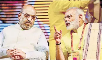  ?? PTI FILE ?? Prime Minister Narendra Modi with BJP president Amit Shah at party's national executive meeting in New Delhi.