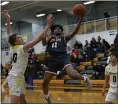  ?? PAUL DICICCO — FOR THE NEWS-HERALD ?? Steven Key drives to the hoop during the Cardinals’ 93-49victory at Riverside on Feb. 12.