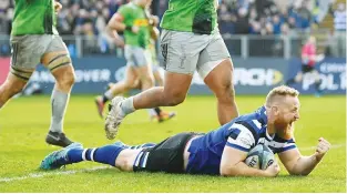  ??  ?? Looking good: Ross Batty celebrates scoring Bath’s third try