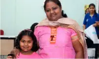  ??  ?? Five-year-old Sanjana Jeevendran with her mother.
