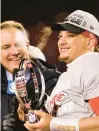  ?? REED HOFFMANN/AP ?? Chiefs quarterbac­k Patrick Mahomes holds the Lamar Hunt Trophy after they defeated the Bengals in the AFC championsh­ip game Sunday.