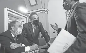  ?? J. SCOTT APPLEWHITE/AP ?? From left, Rep. Ed Perlmutter, D-Colo., Rep. Jamie Raskin, D-Md., and Rep. Joe Neguse, D-Colo., confer on Aug. 24.