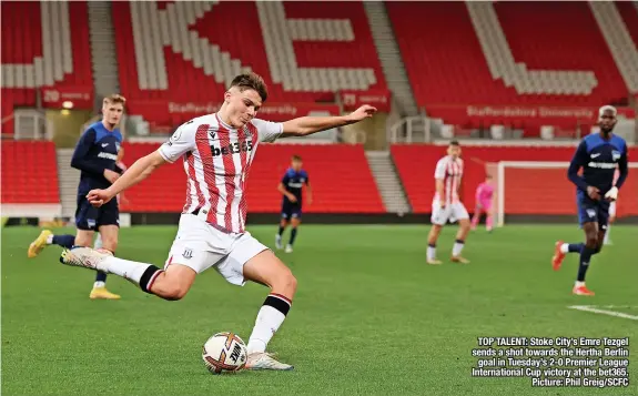  ?? Picture: Phil GREIG/SCFC ?? TOP TALENT: Stoke City’s Emre Tezgel sends a shot towards the Hertha Berlin goal in Tuesday’s 2-0 Premier League Internatio­nal Cup victory at the bet365.