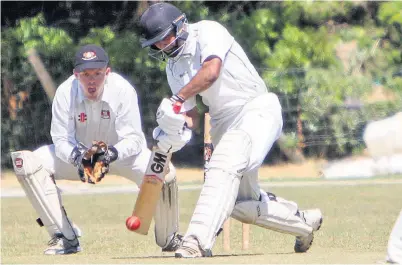  ??  ?? ● Bangor batsman Nadeem Rehman (pictured in previous action) was top scorer with 39 as the league leaders chased down a revised total of 192 to beat Pwllheli