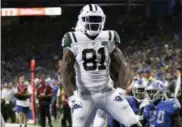 ?? JOSE JUAREZ — THE ASSOCIATED PRESS ?? New York Jets wide receiver Quincy Enunwa (81) celebrates his 21-yard touchdown reception against the Detroit Lions during the second half of an NFL football game in Detroit, Monday.