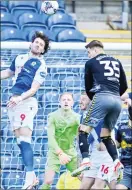  ?? ?? MY BALL: Sam Gallagher heads clear