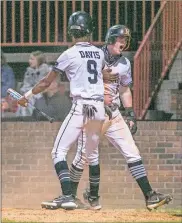  ?? Bambara Aven, @avenphoto ?? Ridgeland’s Nate Davis (9) celebrates with a fired-up Chris Maddeaux after Maddeaux scored a run during last week’s series opener against Cedartown.