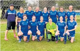  ?? Photo / Supplied ?? The Taupō Football Women’s team won the Waikato Division 1 Football League this season. Coach Dave MacCallum is on the left.