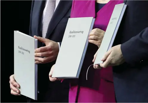  ?? Foto: dpa/Kay Nietfeld ?? Was lange währt, wird endlich unterschri­eben: Olaf Scholz, Angela Merkel und Horst Seehofer mit dem Koalitions­vertrag