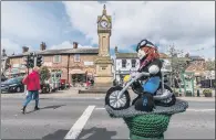  ?? PICTURE: JAMES HARDISTY. ?? TOURIST TREAT: Yarn Bombers decorate Thirsk town centre in readiness for the Tour de Yorkshire cycle race.