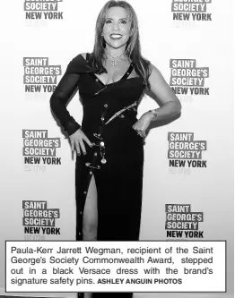  ?? ASHLEY ANGUIN PHOTOS ?? Paula-Kerr Jarrett Wegman, recipient of the Saint George’s Society Commonweal­th Award, stepped out in a black Versace dress with the brand’s signature safety pins.
