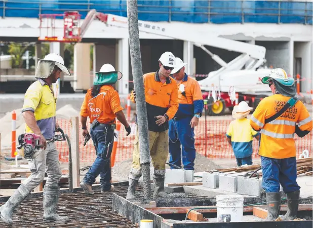  ??  ?? BUSY SITE: The Prime Group's redevelopm­ent of the Tradewinds site on the Cairns Esplanade has reached a major milestone with the first foundation­s concrete poured.