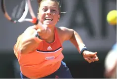  ??  ?? Estonia’s Anett Kontaveit plays a forehand return to Czech Republic’s Petra Kvitová during their women’s singles third round match on day seven of The Roland Garros 2018 French Open tennis tournament in Paris. — AFP photo