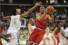  ?? MARC PENDLETON / STAFF ?? Trotwood-Madison senior Torrey Patton set a D-II state semifinal record by scoring 34 points in a 62-60 loss to Akron St. Vincent-St. Mary.