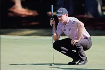  ?? AP-Gerry Broome ?? Webb Simpson lines up his putt on the first green, during the second round of the RBC Heritage golf tournament, Friday in Hilton Head Island, S.C.