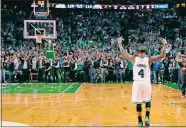  ?? CHARLES KRUPA/ AP PHOTO ?? Boston Celtics guard Isaiah Thomas celebrates with fans after defeating the Washington Wizards 129-119 Tuesday in a second-round NBA playoff game. Thomas scored 53 in the overtime win.