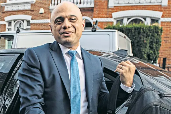  ??  ?? Sajid Javid returns to his London home after his meeting with the Prime Minister