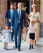  ??  ?? William, Kate, Prince George and Princess Charlotte at Prince Louis’ christenin­g in 2018. Meghan and Prince Harry, then newlyweds, follow close behind.