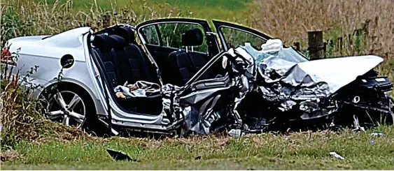  ??  ?? Wreckage: The mangled remains of pensioner James Thomson’s car after it was struck by Anna-Marie Strachan’s vehicle on A90