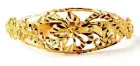  ??  ?? A Far East 22k gold flower bangle for kids.