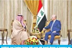  ?? — KUNA ?? BAGHDAD: Iraqi President Barham Salih meets with Kuwaiti Minister of Commerce and Industry Khaled Al-Roudhan.
