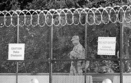  ?? J. SCOTT APPLEWHITE/AP ?? A National Guard member keeps watch Wednesday at the U.S. Capitol, where heightened security remains after the Jan. 6 riot that left five people dead.