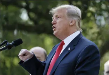  ?? EVAN VUCCI — THE ASSOCIATED PRESS ?? President Donald Trump delivers remarks on trade between the United States, Canada, and Mexico, in the Rose Garden of the White House, Monday in Washington.