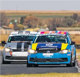  ??  ?? OLD-TIMERS. Tin-top veterans Iain Pepper (Husqvarna Polo) and Waldie Meintjies (VW Polo) in the opening VW Challenge race at Red Star.