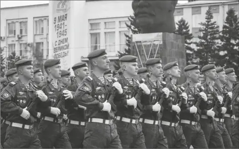  ?? UNCREDITED/AP ?? RUSSIAN SERVICEMEN MARCH during the Victory Day military parade in Ulan-Ude, the regional capital of Buryatia, a region near the Russia-Mongolia border, Russia on Monday marking the 77th anniversar­y of the end of World War II.