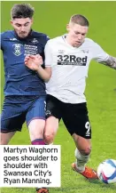  ??  ?? Martyn Waghorn goes shoulder to shoulder with Swansea City’s Ryan Manning.