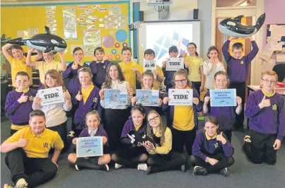  ??  ?? WHALE OF A TIME: Pupils from Glasgow and Ullapool have earned their Ocean Defender stripes