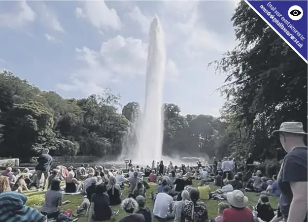  ??  ?? RISING HIGH: Crowds watch the Castle Carr country estate fountain near Booth in the rural Luddenden Valley. Picture: Halifax Rotary Club.