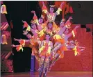  ??  ?? The performanc­e forms in the Acrobatic World shows at Chaoyang Theater include stunning skills such as multipeopl­e cycling (left), balancing gymnastics (center) and jujutsu.