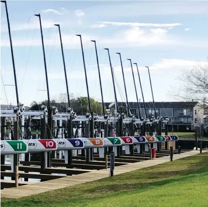  ?? PHOTOS : LAKEWOOD YC ?? Lakewood YC (Texas) is banking on its new fleet of RS21s to attract new and young members keen on team and match racing. Mark McNamara, Terry Flynn, Jay Vige, Ash Walker and Jon Partridge, of RS Sailing, assemble for the fleet assembly in February.