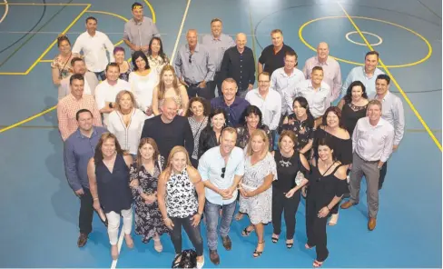  ??  ?? NOW AND THEN: Trinity Anglican School’s Class of 87 gathers at the school for their 30-year reunion and (below) the Year 12 class in 1987 with teacher Brian Springell (front centre) and Cairns Chamber of Commerce president Nick Loukas (back, right).