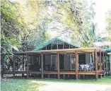  ??  ?? Address/ 39 Cape Tribulatio­n Rd, Kimberley
Features/ Self-sufficient threebedro­om Queensland­er on 1.2 hectares (3 acres), set among tropical rainforest, it has an entertainm­ent deck, workshop, lagoon, seasonal creek, solar energy and back-up...