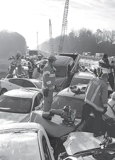  ??  ?? THIS handout image released by the York-Poquoson Sheriff’s Office on Facebook shows first responders working at the site of an accident on the I-64 highway in York County near Williamsbu­rg, Virginia. The accident, involving 69 vehicles, left 51 people injured, according to the Virginia State Police. AFP PHOTO