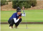  ?? GABRIELA CAMPOS THE NEW MEXICAN ?? Chanet Fiorina determines her strategy for her final putt on Wednesday at the U.S. Golf Associatio­n Women’s State Team Championsh­ips at Las Campanas.