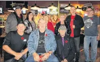  ?? SUBMITTED PHOTO ?? Northside Christmas Daddies volunteers are ready for another year of fundraisin­g. From left, front row, Ward Glogowski, Bob MacDonald and Carl Abraham; second row: Eddie and Brenda MacDonald, Mia MacDonald, Rose McGuigan, Peter MacDonald and Kenny Cox; third row: Cathy Garland, Blair Gillis, Mia Patterson and Danny MacDonald.